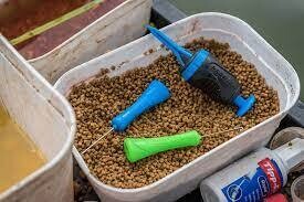FLOATER PELLET BANDER